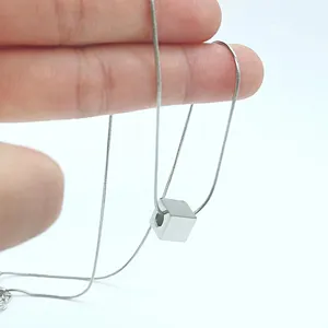 Minimalist titanium steel cube pendant necklace, stylish unisex clavicle snake chain jewelry.