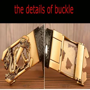 Detailed view of men leather belt automatic metal buckle with dragon relief pattern close up