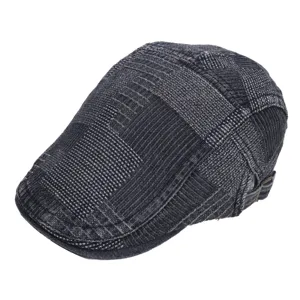 Detailed side view of vintage dark denim flat cap showing textured fabric and metal buckle.
