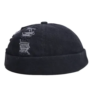 Zwarte denim docker cap voor heren, retro pet zonder klep met kapotte details voor zomerse casual.
