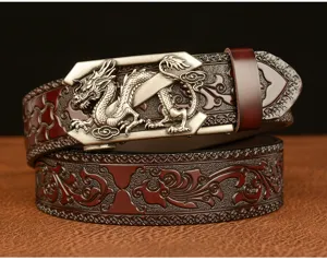 Mens vintage leather belt with intricate carved patterns and metallic dragon automatic buckle.