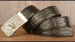 Men's genuine leather automatic buckle belt featuring stylish elephant metal buckle design.