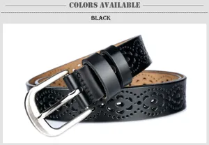 Detailed view of a black women's leather belt with intricate cut-out patterns and a silver buckle.