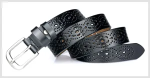 Detailed view of black leather women belt with hollow carved floral pattern and metal pin buckle.