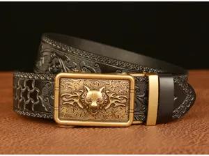 Close-up detail of luxury men leather belt with embossed wolf head buckle and floral pattern.