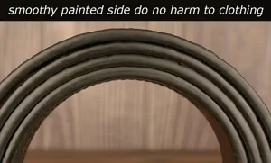 Close-up detail of black leather belt smooth painted edge showing fine craftsmanship
