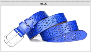 Detailed view of women's blue leather belt with hollow floral pattern and silver buckle.