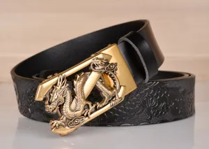 Men vintage embossed dragon leather belt automatic buckle detail shot showing quality texture