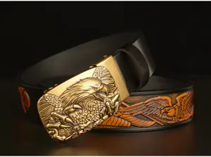 Detailed view of men vintage carved leather belt with golden eagle automatic buckle texture.
