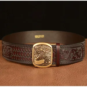 Men's automatic buckle leather belt with embossed scroll pattern and detailed eagle metal buckle.