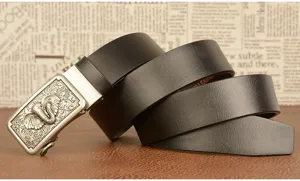 Detailed view of men leather belt featuring intricate elephant relief automatic metal buckle.