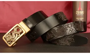 Detailed view of the luxurious men's leather belt featuring intricate dragon buckle and embossed strap design.
