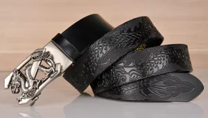 Men's leather automatic belt with embossed dragon pattern, stylish metal buckle design.