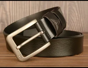 Close-up detail of genuine cowhide leather belt with stylish metal pin buckle and bull logo.