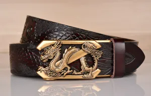 Close-up detail of the men's leather belt featuring embossed dragon pattern and metal buckle.