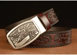 Detailed close-up view of the exquisite embossed leather belt strap and metallic buckle.