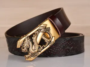 Men leather belt detail view showcasing intricate dragon buckle and embossed pattern.