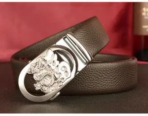 Men's genuine leather automatic buckle belt with dragon embossing and stylish metal design.