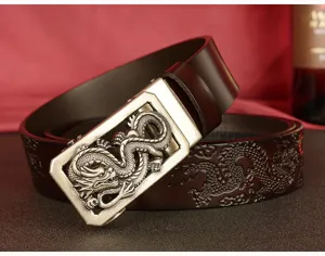 Men's leather belt featuring a detailed metal dragon automatic buckle and embossed strap.
