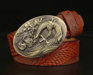 Detailed view of mens dragon embossed leather belt with vintage metal buckle and scale pattern.