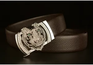 Men's genuine leather belt detail showcasing a sparkling rhinestone tiger head automatic buckle.