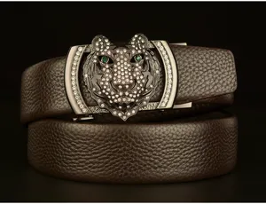 Men's leather belt with dazzling rhinestone tiger head automatic buckle, stylish luxury design.