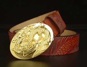 Close-up view of the luxury gold dragon embossed buckle and textured brown cowhide belt detail.