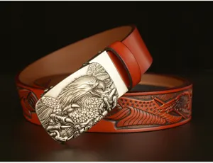 Detail view of men's leather belt with embossed eagle buckle and vintage carved strap design.