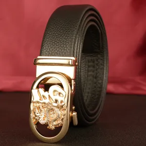 Men's leather belt with gold dragon automatic buckle rolled up main view display.