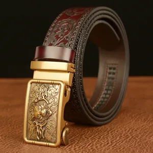 Men's leather belt with wolf head automatic buckle and embossed floral pattern design.