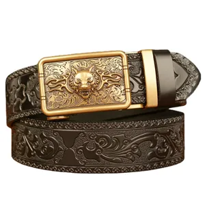 Men's leather belt with wolf head automatic buckle and embossed vintage scroll pattern.
