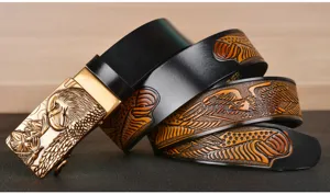 Men leather belt with eagle embossed design and automatic metal buckle for jeans detail.