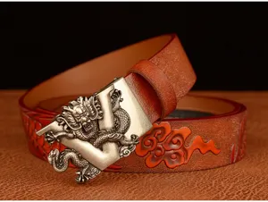 Close-up detail shot of the embossed leather belt strap with metallic dragon V buckle.