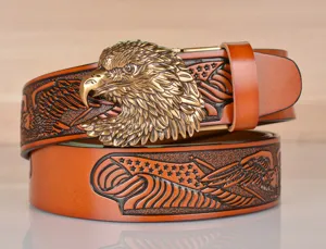 Vintage leather belt for men with brass eagle head automatic buckle and embossed patterns.