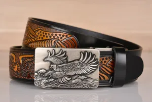 Men's leather belt with eagle embossed strap and metallic automatic buckle design for daily wear.