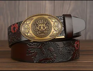 Men's leather belt detailed view, vintage dragon embossed pattern with ornate bronze buckle.