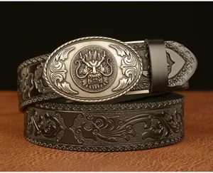 Detailed view of mens retro dragon buckle leather belt with embossed classic floral patterns.