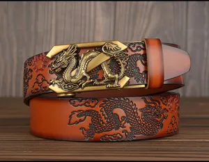 Detailed view of men's embossed leather belt featuring an intricate dragon pattern and metal buckle.