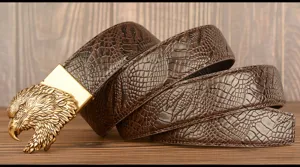 Mens retro leather belt detail showing the intricate golden eagle head buckle and textured cowhide.