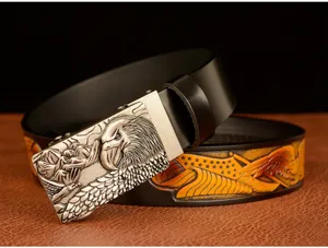 Close-up detail of the metal eagle buckle and embossed leather strap texture for men.