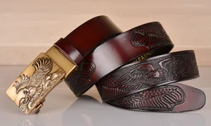 Men's leather belt with eagle embossed pattern and automatic metal buckle for daily wear.