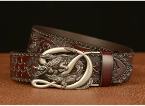 Detailed view of vintage embossed leather men belt featuring a metal crocodile buckle.
