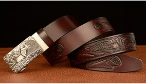 Men's leather automatic buckle belt with detailed eagle head design and embossed strap.