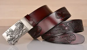 Men's leather belt featuring a majestic eagle automatic buckle and detailed embossed strap design.