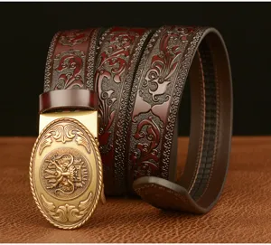 Detailed view of retro embossed men leather belt with golden dragon automatic buckle.