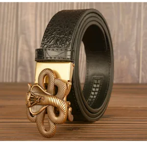 Detailed close-up of men's black crocodile pattern leather belt featuring unique golden cobra buckle.