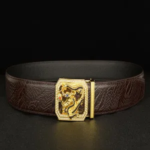 Men genuine leather belt featuring luxury rhinestone dragon automatic buckle detail.