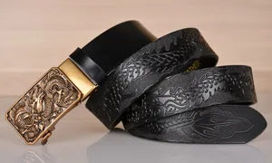 Men's genuine leather automatic buckle belt featuring intricate dragon embossed design for jeans.