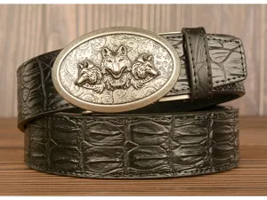 Men vintage leather belt with three wolf head buckle and alligator pattern strap detail.