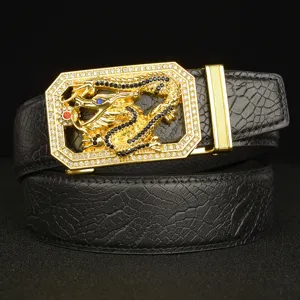 Detailed view of luxury men's black leather belt with gold rhinestone dragon auto buckle.